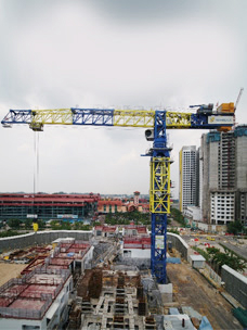 Orange Machinetech tower crane for heavy lifting sale & rent